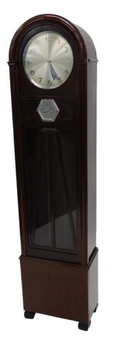 A 1930s Art Deco style eight-day longcase clock, in mahogany case, the silvered dial with Arabic numerals, and set with an aneroid barometer below, glazed lower case with chrome weights, pendulum, 90cm high.