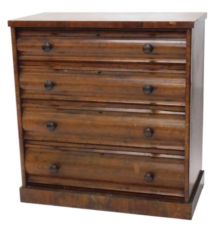 A Victorian figured mahogany chest of four graduated drawers, with carvetto moulded fronts, and turned knop handles, on a plinth, 115cm high, 109cm wide.