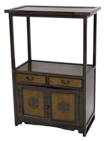 Chinese style display stand and cabinet, with high platform top, fitted two drawers with cupboard below having figured veneer front, and studded metal fittings and hinges, 110cm high, 75.5cm wide.