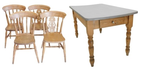 A Victorian style pine kitchen table, with painted rectangular top, fitted with frieze drawer to one end, on turned and tapered legs, 153cm x 92cm x 79cm high, and a set of four beech chairs with slat backs, legs and stretchers.