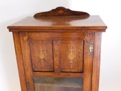 A Victorian rosewood side cabinet, with low gallery back, and enclosed by a single door, with plush lined shelves within, the door partially glazed, with two inlaid panels, on pot castors, 98cm high, 57cm wide, 35cm deep. - 2