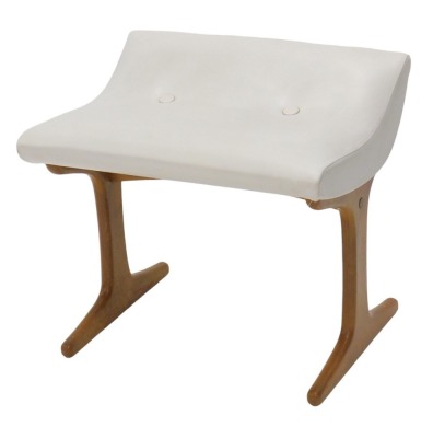 A 1970s dressing table stool, possibly by Schreiber, with white button upholstered vinyl seat and teak under frame.