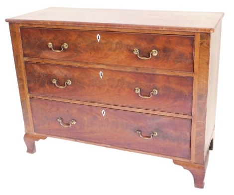 A large late Georgian figured mahogany chest of three long graduated drawers, with brass swan neck handles, raised on shaped bracket feet, 121cm wide.