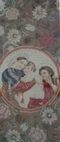 A 19thC wool work picture depicting a Madonna and Child and Angel within a border of flowers