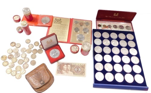 20thC coinage, comprising 1960s three pence pieces, 1967 florins, 1967 half crowns, half crown coin pack with mainly 1935 and later coins, the 1985 uncirculated Chinese coin set for the year of the ox, ten dollar tiger and ox commemorative crowns, the 198