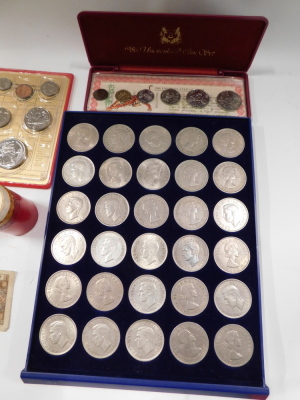 20thC coinage, comprising 1960s three pence pieces, 1967 florins, 1967 half crowns, half crown coin pack with mainly 1935 and later coins, the 1985 uncirculated Chinese coin set for the year of the ox, ten dollar tiger and ox commemorative crowns, the 198 - 2