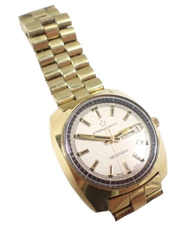 An Eternamatic Sevenday gent's wristwatch, with electroplated case and strap, on stainless steel back, 3cm diameter, boxed.