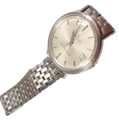 An Eternamatic Centenaire 61 stainless steel cased gent's wristwatch, the silvered dial with batoned border and date aperture, 3cm diameter, boxed.