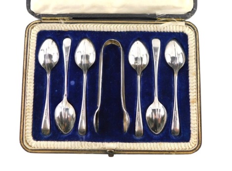 A George V silver presentation set, with six teaspoons and sugar tongs, rat-tail pattern, maker HW, Sheffield 1918, 3.35oz, in fitted case.