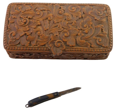 A Victorian carved boxwood table snuff box, with scroll decoration, and a miniature tortoiseshell and stainless steel pen knife, the pen knife 3cm, the box 10.5cm wide. (2)