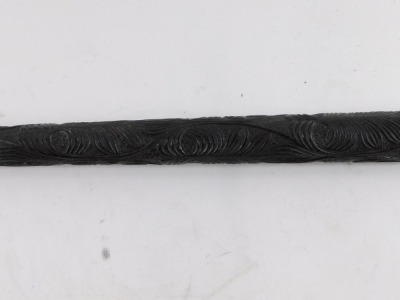 A carved ebony walking stick, with tribal carving and brass cap end, 95cm long. - 3