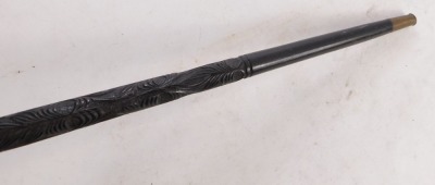 A carved ebony walking stick, with tribal carving and brass cap end, 95cm long. - 4