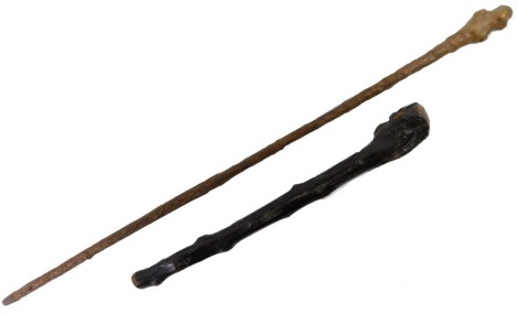 A walking stick, with brass capped end, 91cm long, and a Shillelagh with carved inscription, 51cm long.