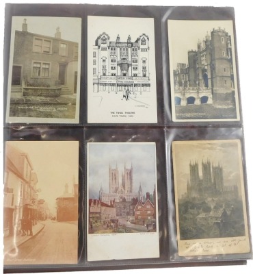 A 20thC postcard album, to include black and white postcards of town scenes, a To My Dear Mother silk postcard, military portrait postcards, some later coloured postcards of Lincoln and surrounding villages, enclosed in an album.