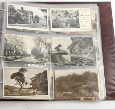 A 20thC postcard album, to include black and white postcards of town scenes, a To My Dear Mother silk postcard, military portrait postcards, some later coloured postcards of Lincoln and surrounding villages, enclosed in an album. - 3