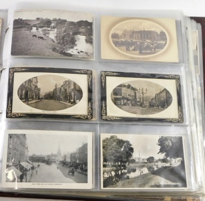 A 20thC postcard album, to include black and white postcards of town scenes, a To My Dear Mother silk postcard, military portrait postcards, some later coloured postcards of Lincoln and surrounding villages, enclosed in an album. - 4