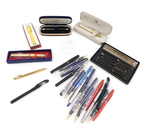 A collection of fountain pens and ballpoint pens, comprising a Sheaffer USA gold coloured cased fountain pen, in presentation box, a L'Plume pen, and a Sheaffer yellow ball point pen. (a quantity)