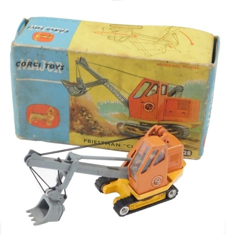 A Corgi Toys priestman 'Cub' shovel, number 1128, boxed.