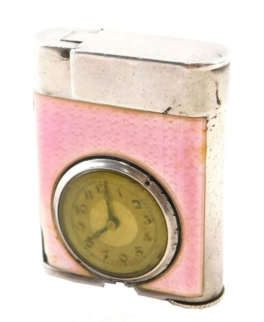 A Brevez French enamel pocket lighter, with pink enamel and clock face, in white metal casing stamped 935, 4.5cm high.