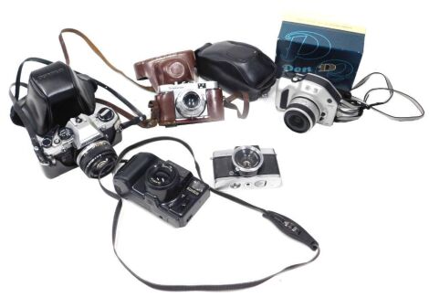 A group of cameras and camera equipment, comprising a Konica Z/UP 80RC a Nikon Pronea S, a Voiglander Vito B, a boxed Olympus Pen D, and an Olympus OM10. (1 box)