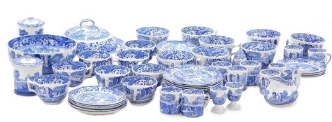 A Copeland Spode blue and white part tea and dinner service, comprising egg cup, fruit bowl, tureen and cover, two mustards and lids, fourteen tea cups, eight coffee cans and saucers. (2 trays)