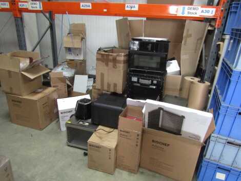 A mixed trade bay of BioChef products, including dehydrators, Astro vacuum blenders, etc.