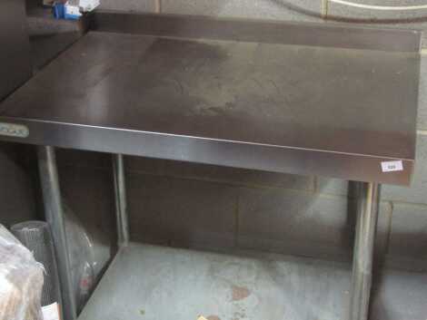 A Vogue stainless steel serving table.