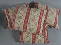 A set of four cushions