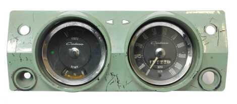 A Ford Cortina mark 1 dash in green, with both gauges.