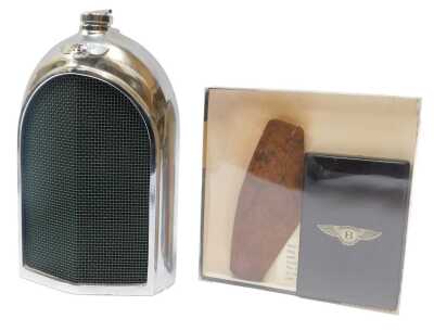 A Bentley Ruddspeed radiator decanter, and two pieces of burr walnut veneer from a Bentley. (3)