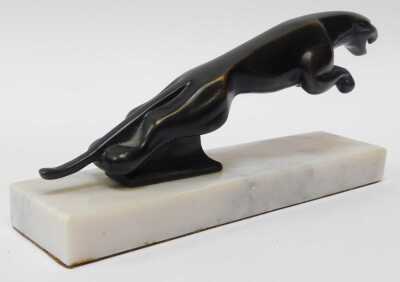 A Jaguar car mascot, possibly bronze, mounted on a marble base, 10cm high. - 2