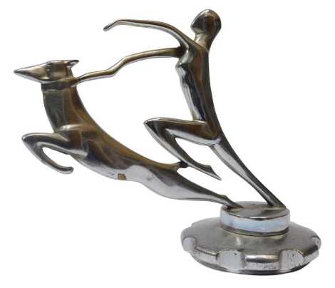 A chrome car mascot in the manner of Franz Hagenauer, with an abstract greyhound and female walker, mounted on a radiator cap, 14cm high.