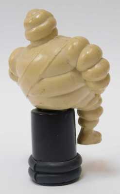 A 1960s Bakelite 'Bibendum' Michelin Man, mounted on a plastic base, 13cm high. - 2