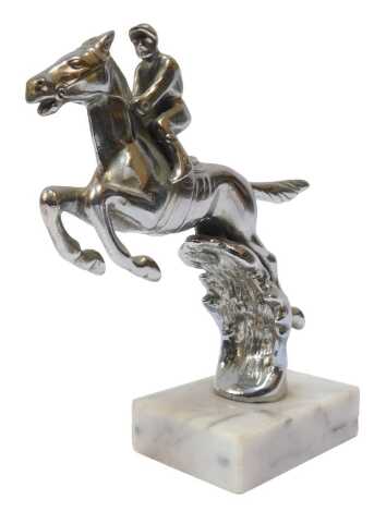 A Desmo car mascot of a horse and jockey, mounted on a marble base, 15cm high.