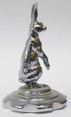 An Alvis chrome-plated hare car mascot, mounted on a chromed radiator cap, 14cm high. - 2