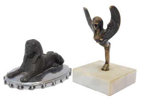 An Armstrong Siddley car mascot, modelled as a sphinx in recumbent pose, mounted to a plinth, and a winged sphinx mascot, mounted on a marble plinth, 10cm high. (2)