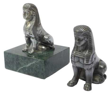 Armstrong Siddley seated sphinx car mascot, and another, 10cm high and 9cm high, without plinth. (2)