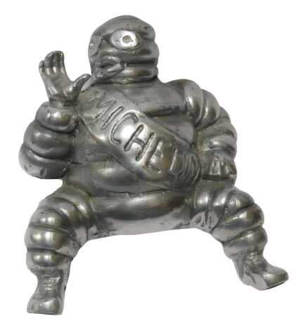 A chrome-plated cast 'Bibendum' Michelin Man seated figure, 19cm high.