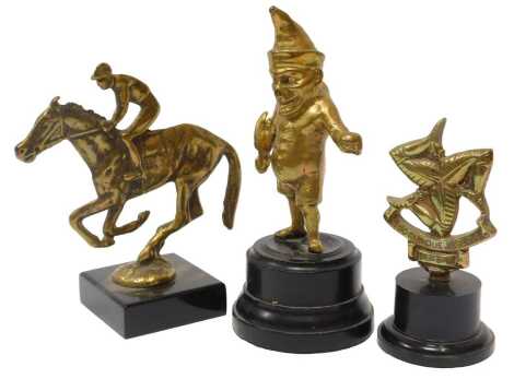 Three brass car mascots, including Mr Punch mascot, Isle of Man mascot, and a jockey. (3)