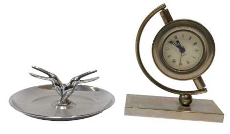 A Briggs National Tyre Service toucan ashtray, and a desk clock. (2)