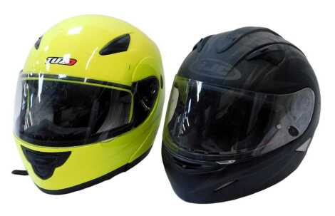 Two motorcycle helmets, comprising Tuzo in fluorescent green, model ST-01, and a HJC, in black.