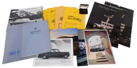 Two Rolls Royce calendars, each for 1985, together with Rolls Royce in the Twenties booklets, 18ct gold pin, etc. (a quantity)