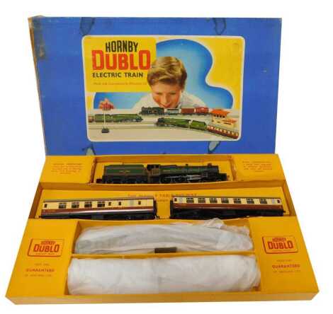 A Hornby Dublo EDP20 passenger three rail train set The Bristolian, including a Castle class locomotive 7013 Bristol Castle, in BR green, and two mark 1 coaches in chocolate and cream, supplied with three rail track, boxed.