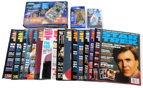 Various Star Trek magazines, a Star Trek Next Generation Tricorder, boxed, pin badge, and a 4gb USB drive. (1 box)