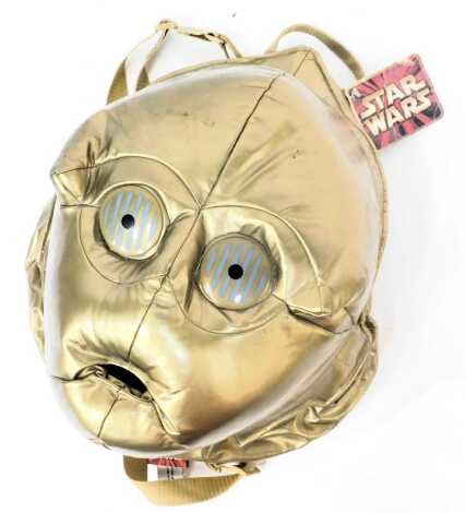 A Star Wars C3P0 backpack, 33cm high.