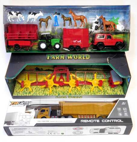 A remote control articulated lorry, together with a Farm World Rotary tedder, etc. (a quantity)