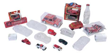 Coca-Cola diecast vehicles and other memorabilia, including Coca-Cola contour bottle with lights, Lledo The Coca-Cola Santa Collection SL21004 1928 Chevrolet van, ?? MGF 1.8I Coca-Cola, Chevrolet van Enjoy Coca-Cola, etc. (1 box)