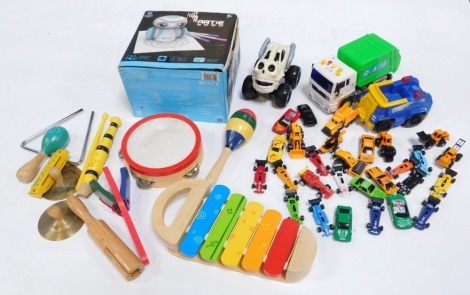 An Artie 3000 drawing robot, children's wooden musical instruments, plastic cars, etc. (a quantity)