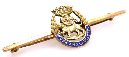 A York and Lancaster Regiment bar brooch, yellow metal and enamel, stamped 9ct, 3.4g.