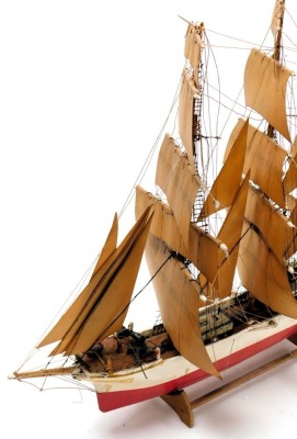 An early 20thC wooden scale model of a Norwegian sailing ship, "Heltodos", with a wooden hull, three fully rigged masts and sails, on a wooden cradle, 72cm wide. - 2